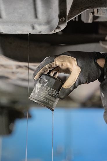Car raised on a lift in the service bay